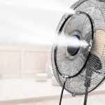 Dynabreeze 350mm Low Pressure Fan Misting Ring attached to a fan, providing a fine mist for effective cooling in outdoor and industrial space