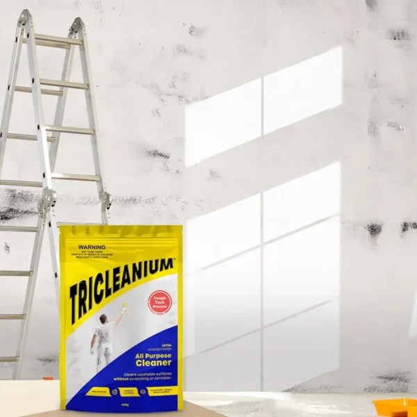 Tricleanium Ultra Concentrated Cleaner 400g in use near a clean tiled wall - ideal for surface preparation and stain removal.