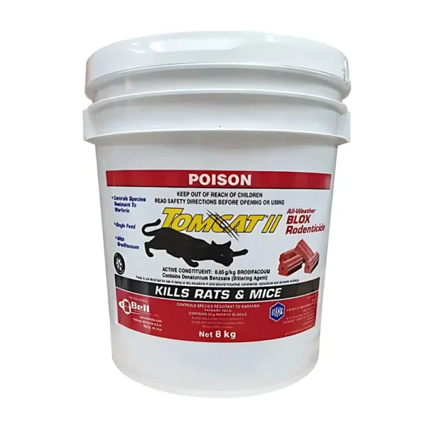 Tomcat II Blox rodenticide blocks on a surface, ready for use.