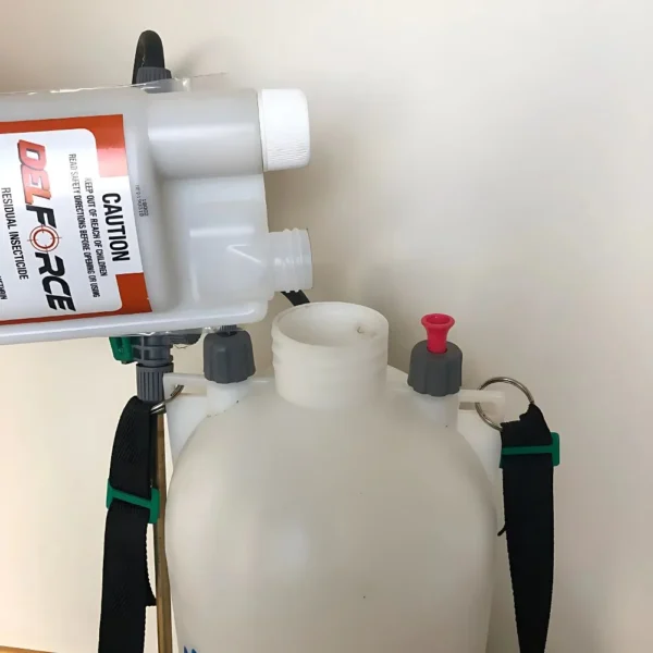 Diluted Delforce Insecticide in clear spray bottle on white background