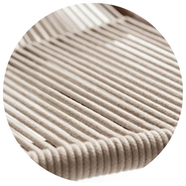Close-up detail of the woven design on an outdoor lounge chair