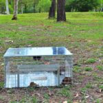 Close up of toad trap one-way finger doors that allow cane toads to enter, but not exit the trap.