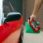Turtle Wax Color Magic Radiant Red Wax FG52711 500ml with infographic callouts highlighting colour restoration, swirl fill, and long-lasting protection on white background