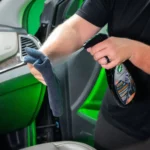 Turtle Wax Inside Job 473ml with infographic callouts showing cleaning power, UV protection, and anti-static finish on white background